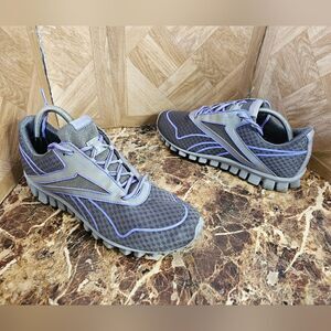 Reebok women's Realflex running  gray shoe size 11.   440